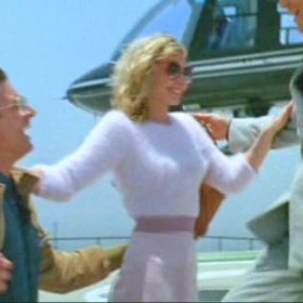 Just in case her skintight suit in the movie wasn't hot enough...