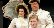 Jennifer Sperry as Mother, Rocky Miller as Father and Logan Gould as the Little Boy ( Edgar ) in the 2013 Kentwood Players' revival production of the musical "Ragtime" at The Westchester Playhouse in Los Angeles. Photo by Shari Barrett.