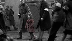 A little Jewish girl wearing a .