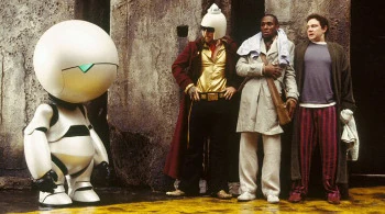 In the trio lineup, the real human is to the far right.