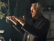 Abner holding the dagger