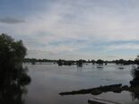 Heavy flooding in a Gloucestershire field after a major UK/Irish/French/Belgian cyclone in 2121