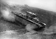 A gigantic Soviet T-35 heavy tank speeds towards fortifications outside Dresden.