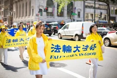 Falun Gong protest in New York City. The movement has seen popularity among Westerners in multicultural cities.