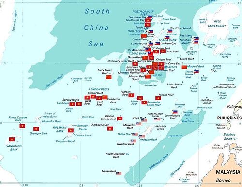Map of the Spratly Islands with flags to indicate which country is occupying the island, reef, shoal, cay, or bank.