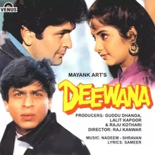 A poster for Shah Rukh Khan's first movie role. In the foreground: SRK. In the background: veteran actor Rishi Kapoor (l) and actress Divya Bharti (r)