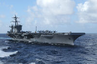 The ANZS Commonwealth, formerly known as the USS Carl Vinson, during a mission in the Southern Hemisphere.