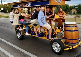 One of Torrington's now-iconic pedal pubs. Guests can enjoy a nice evening out having drinks and bar food while touring the city simultaneously. The pedal pubs have become a symbol of Torrington's cultural scene.