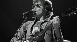 John Lennon performing