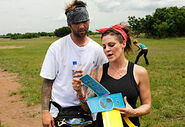 Nick & Vicki reading a clue during the third leg.