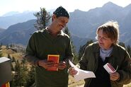 Steve & Linda reading the Roadblock clue in the second leg.