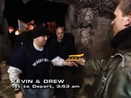 Phil giving the first clue to Kevin & Drew.