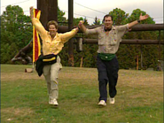 Teri & Ian running to the Finish Line.