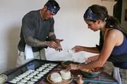 Vanessa & Ralph making empanadas during the first leg.