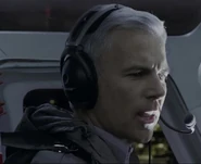 John Burke as Newscaster (News Chopper)