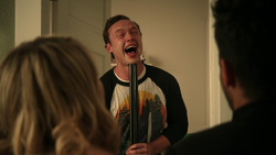 Eugene tries to shoot himself after witnessing a worse version of his hell.png