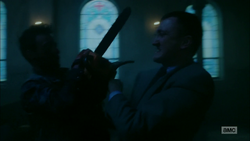Cassidy and Fiore fight over the chainsaw.png