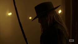 The Saint of Killers looks at his bloodied saber