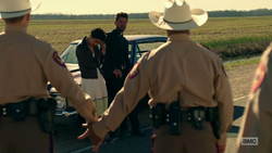 Jesse commands two state troopers to hold hands.png