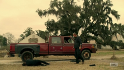 Jody stands over Jesse.png