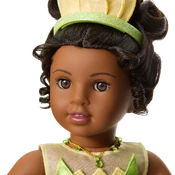 Close up of face, necklace, and tiara.