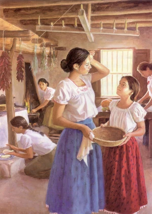 Ana working in the kitchen.