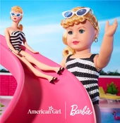 The Classic Barbie Collector Doll next to the matching Barbie.