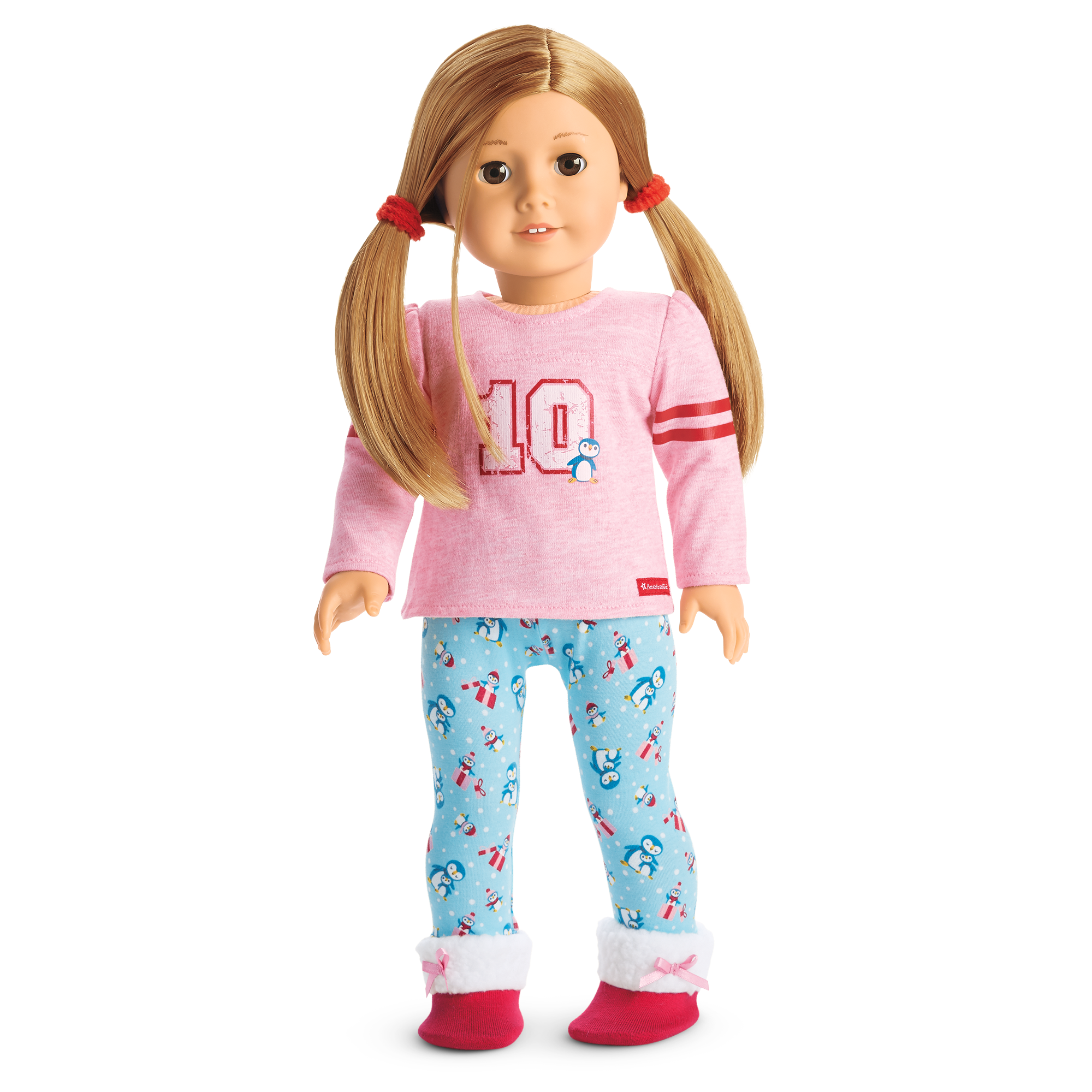 girl and doll matching christmas pajamas