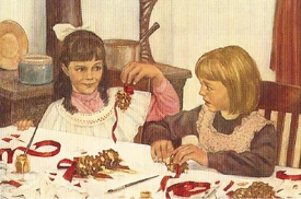 Samantha and Nellie attempt to make corsages.