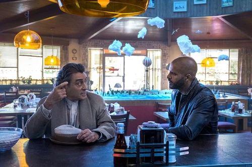 Mr. Wednesday and Shadow in a diner