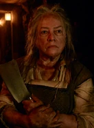 Kathy Bates as the re-enacted The Butcher