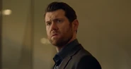 Billy Eichner as Brock