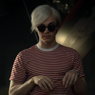 Evan Peters as Andy Warhol