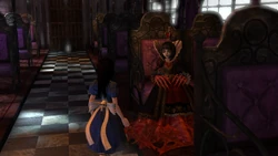 Alice talking to the Queen in the Infernal Train