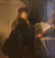 568px-Rembrandt - A Scholar Seated at a Desk-1-