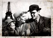 Augustin Lambert and his family far in front of Eiffel Tower.