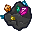 A rock with multicolored gems sticking out of it.