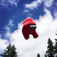 A screenshot of a video that Innersloth posted about the Crewmate Plushie.