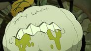 The pumpkin monster growling at Sprig.