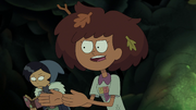 Marcy ignores Anne as she is distracted by reading.