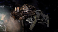 Bobby's fighter docked with the Eureka Maru