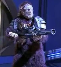 Bloodmist with a gun in the boarding to the Andromeda Ascendent.