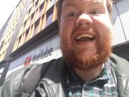 Andywilson92 in front of a YouTube building in London, May 2018.