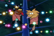 Norbert and Daggett holding on to the decorations