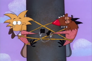 Daggett tries to gnaw the telephone pole, but…