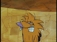 The top of Norbert's hair is cropped off.