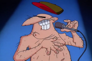 The emcee's cap is briefly floating upwards while the emcee is announcing