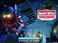 The previous loading screen with Optimus Prime, Bumblebee, and Bat Pigs.