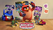 The Angry Birds Movie loading screen with Red playing with Optimus Prime, Megatron, Grimlock, Rodimus and Starscream and behind him is some Angry Birds Transformers photos