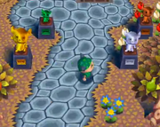 The four trophies in Animal Forest.